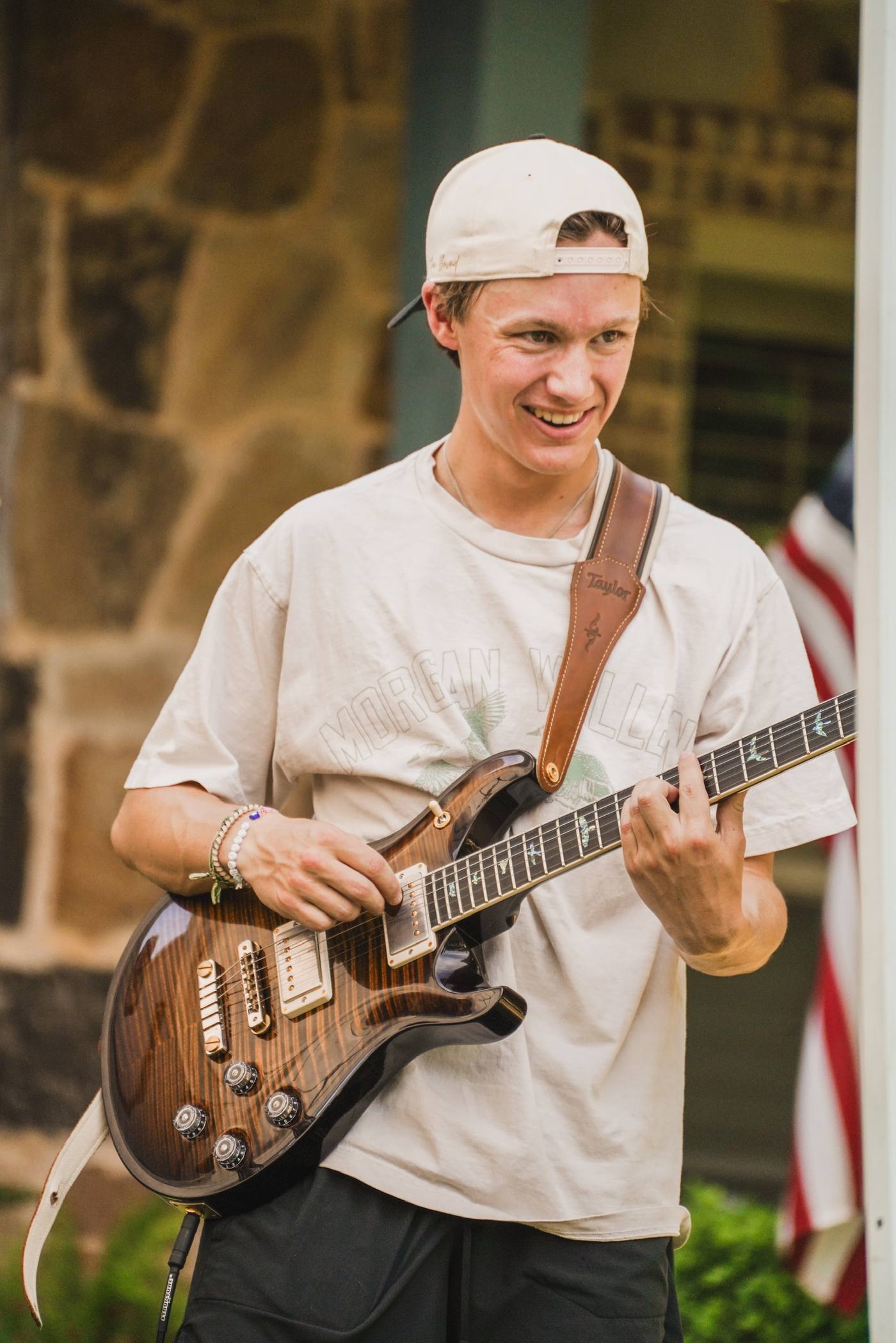 Bretton playing guitar